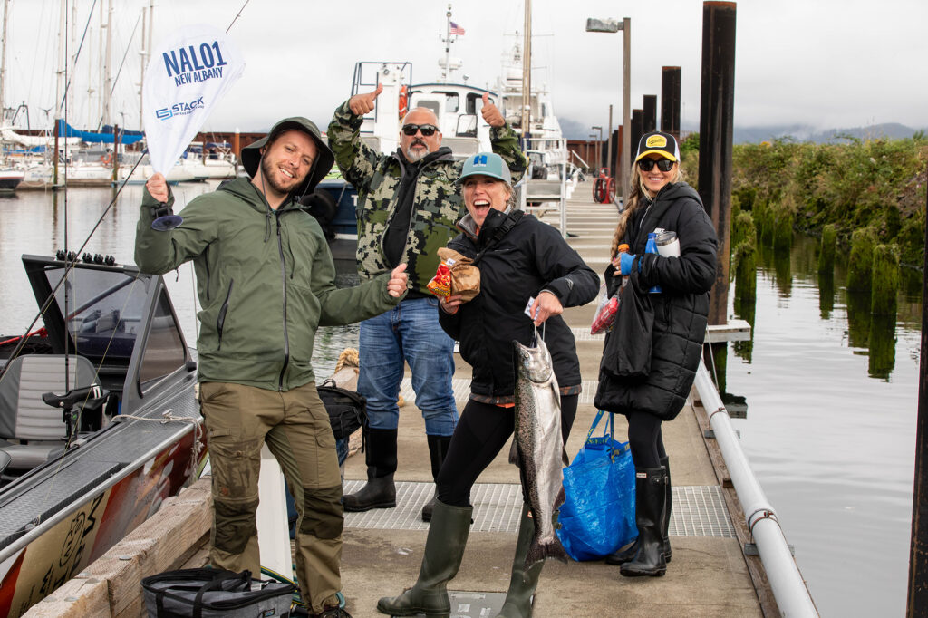 A team of anglers with their catch at STACK's 20th annual charity fishing tournament.